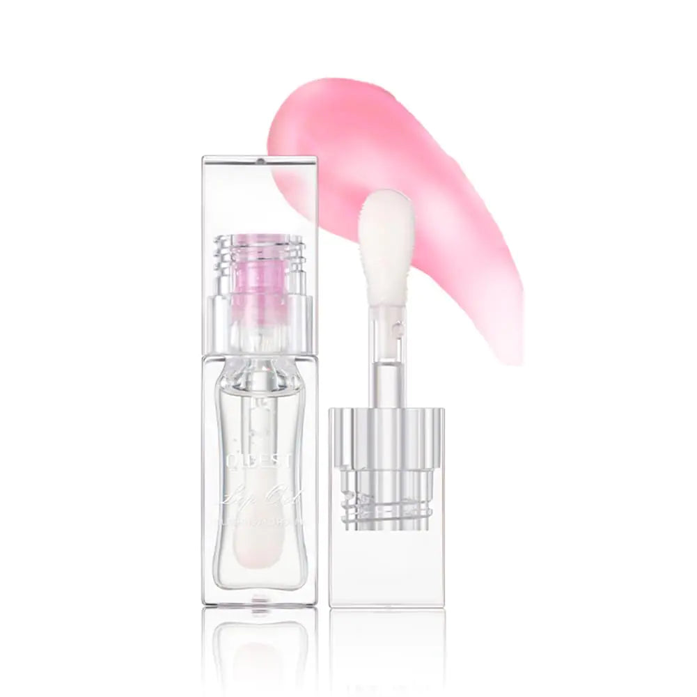  Transparent lip oil with color-shifting pink hue in a minimalist clear bottle.